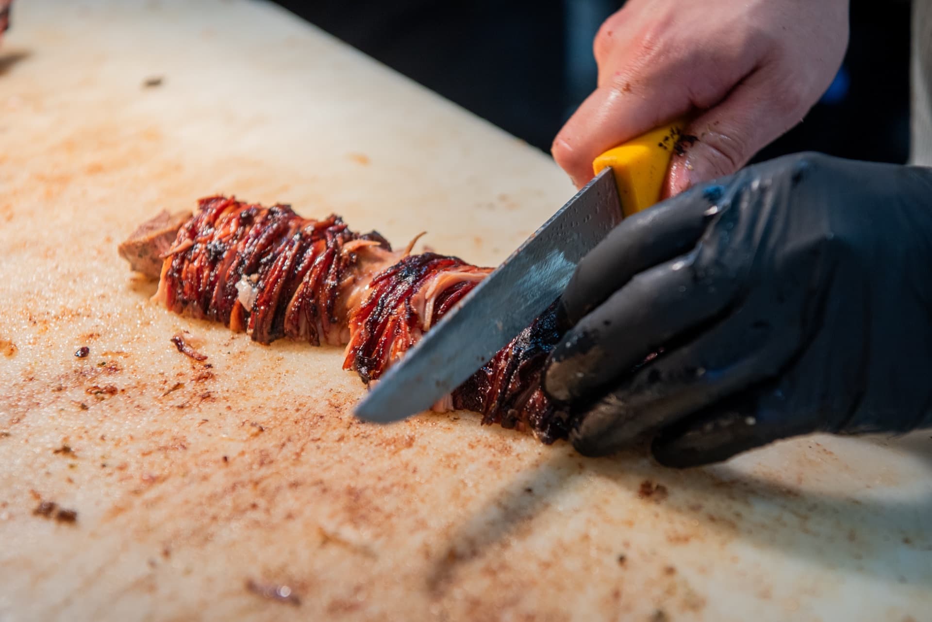Kokoretsi being carved on the counter