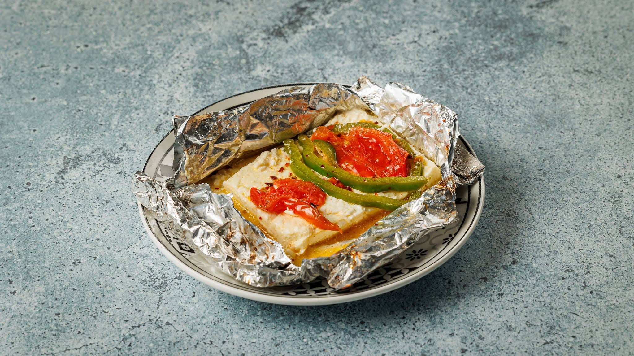 Grilled feta on the plate