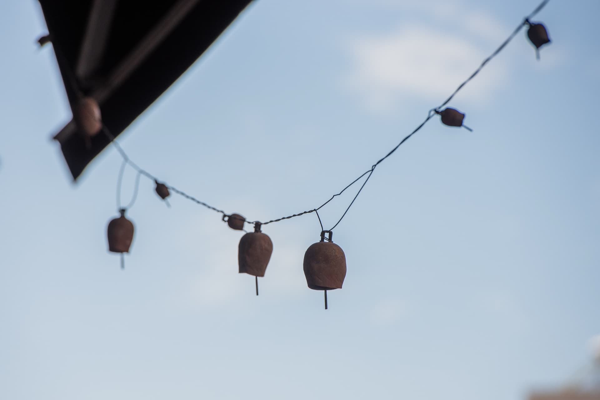 Traditional bells hanging from the ceiling