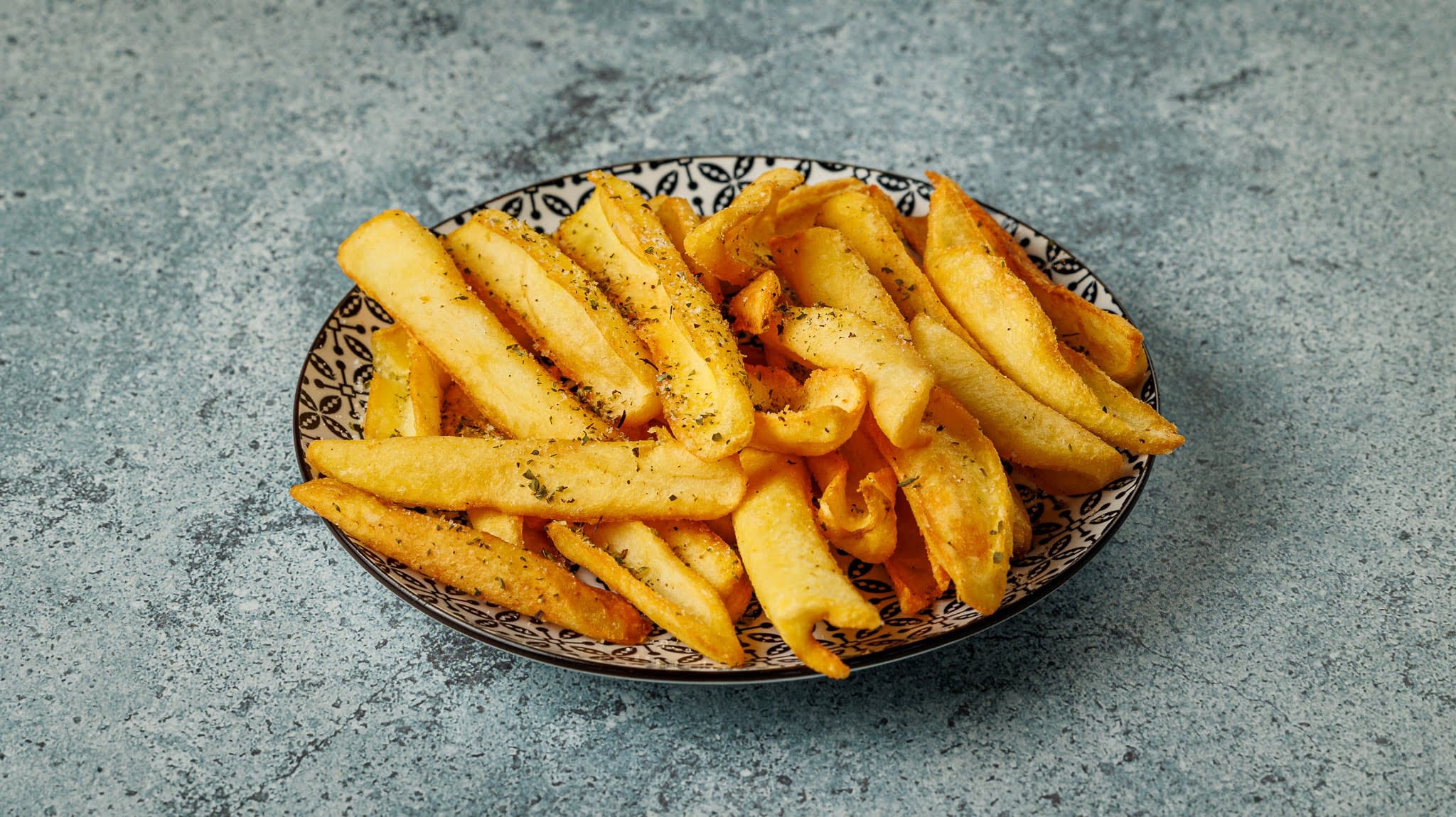 Fried potatoes on the plate